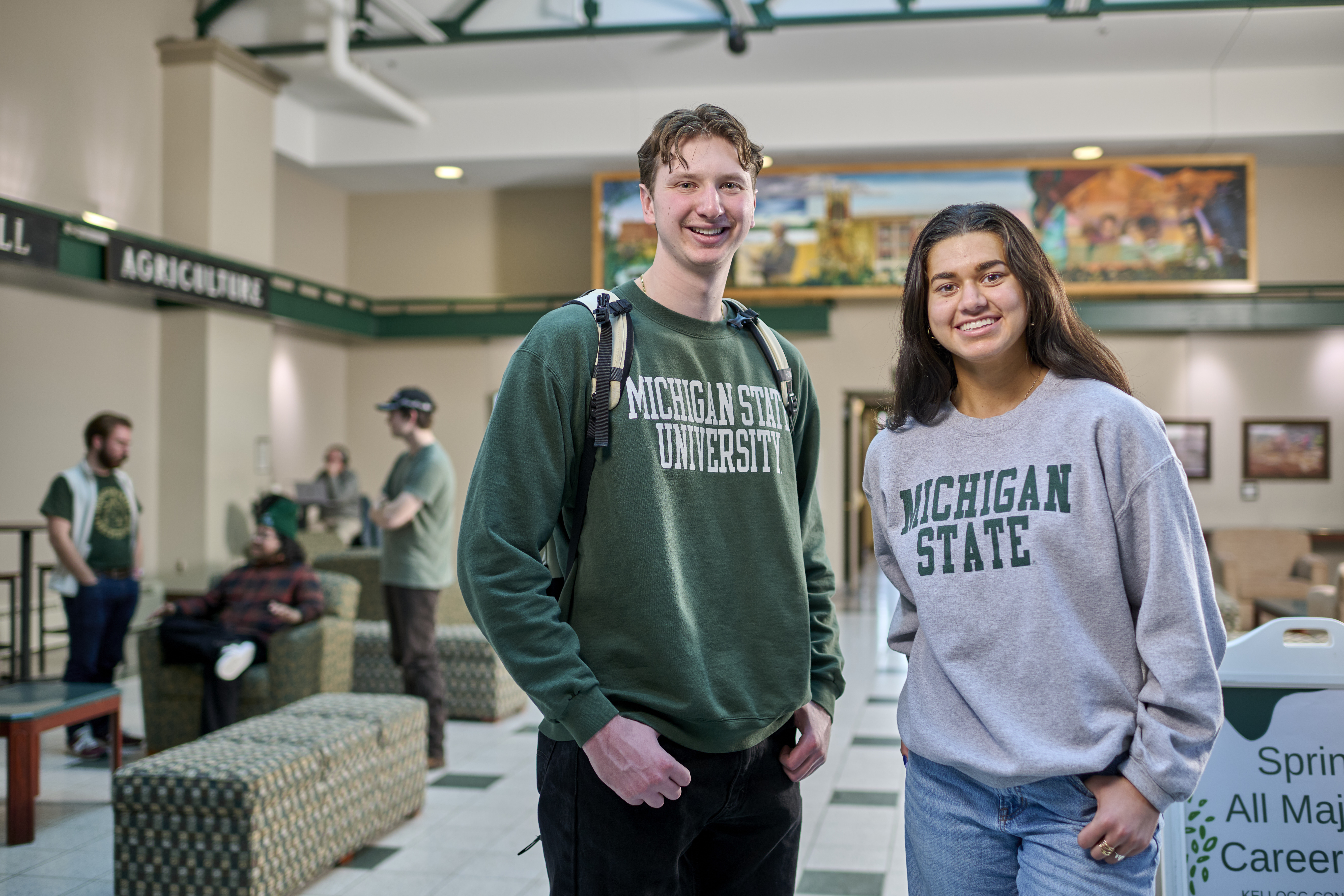Photos of CANR students in the Ag Hall atrium.